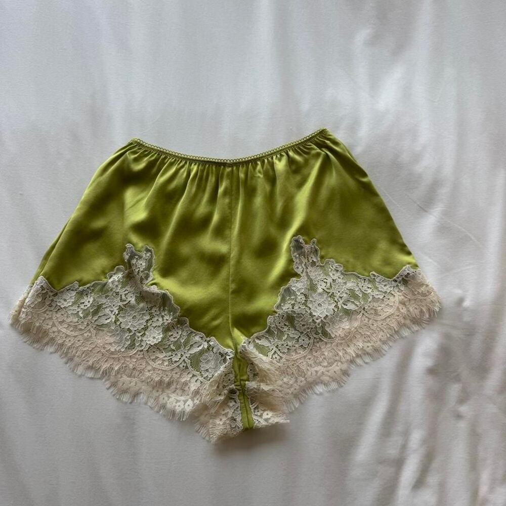 Green silk lace shorts with white lace trim